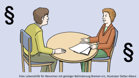 Zwei Personen sitzen um einen Tisch und unterhalten sich.