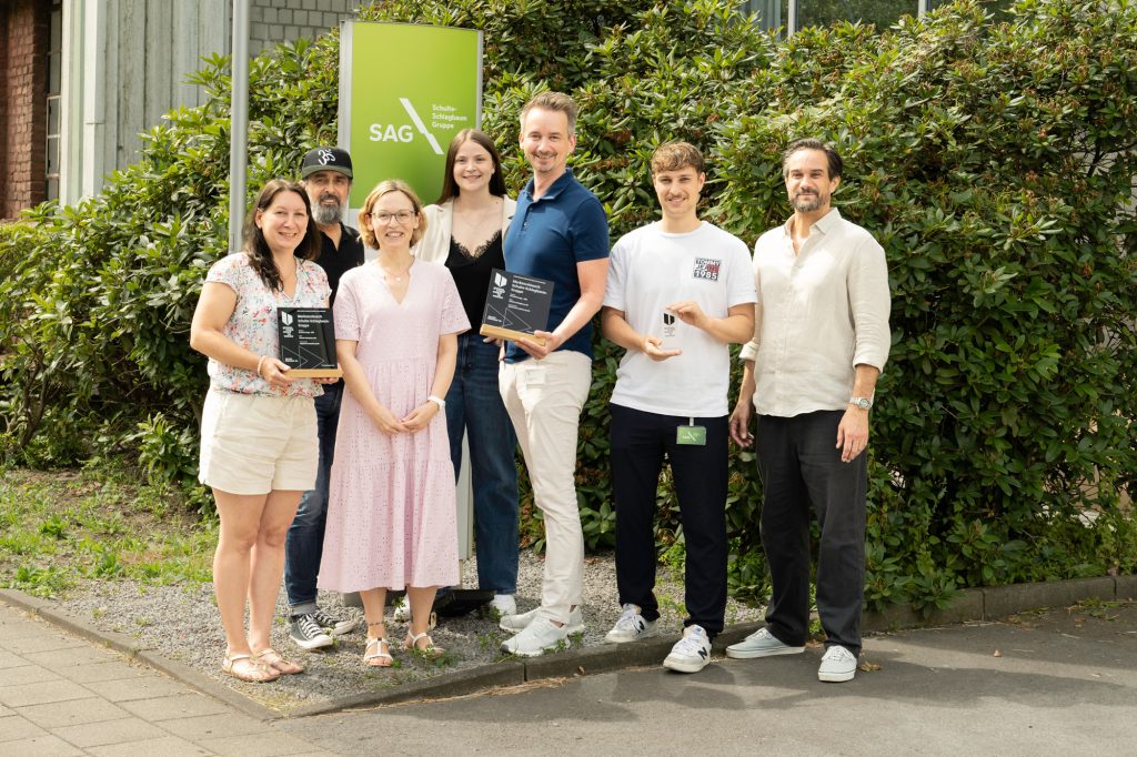 German Brand Award 2026 Gruppenbild mit dem Team der SAG und der Agentur wppt:kommunikation am Firmensitze der SAG in Velbert